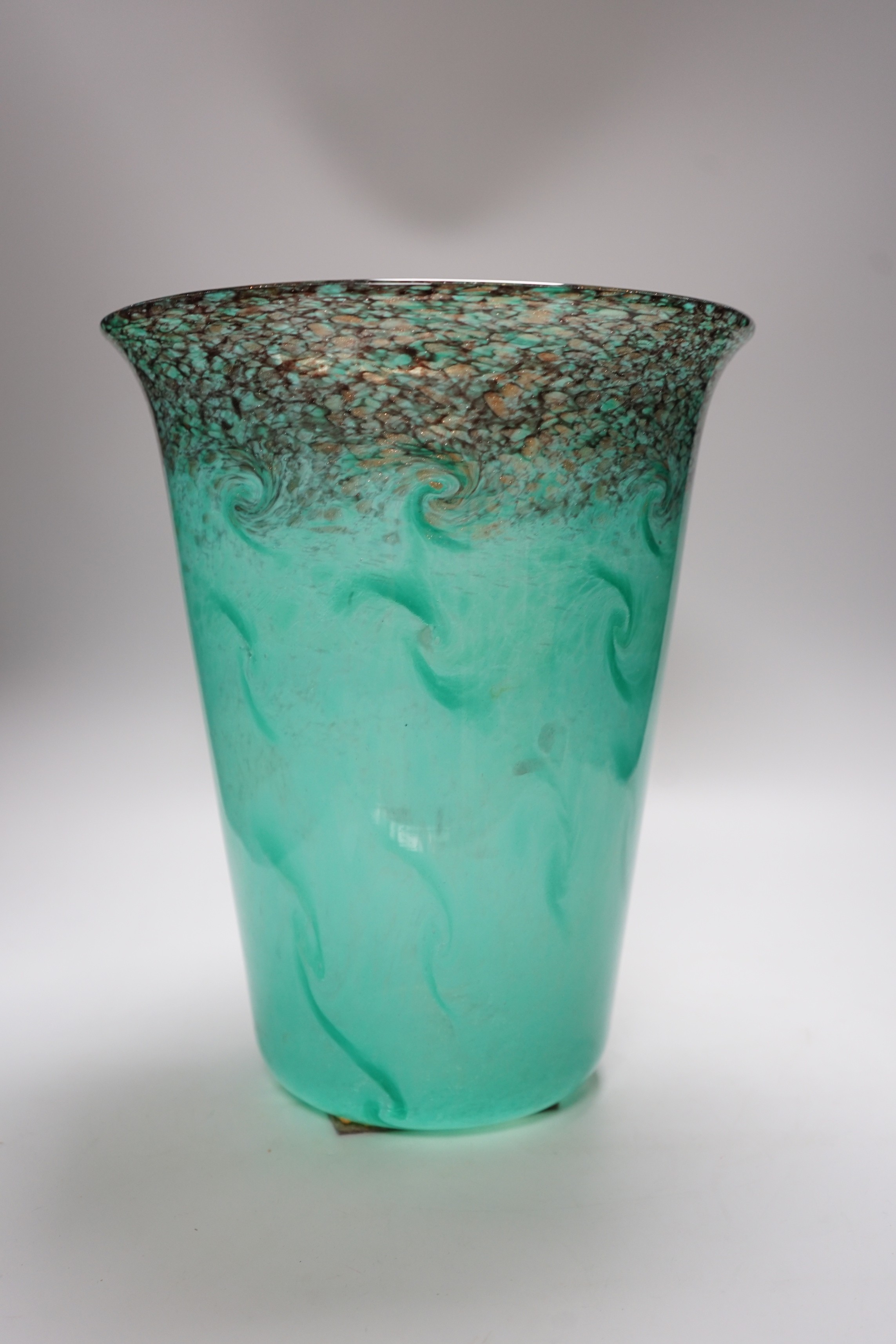 A large 1930s Monart art glass vase of cylinder form, with a slightly flared neck, shape GD, decorated with tonal blue swirls with a mottled black rim swirling into the blue, flat polished pontil, 33cm high